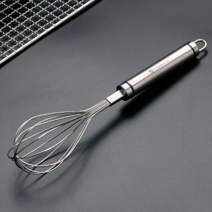 table-grise-fouet-inox